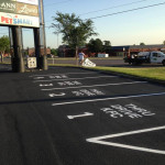 Custom Parking Stencil Striping after Sealcoat and Crackfill